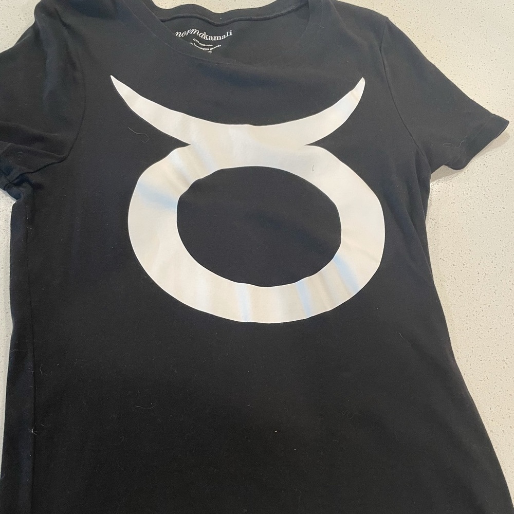 Cute TAURUS fitted women’s tshirt with Taurus dates and wording on side.